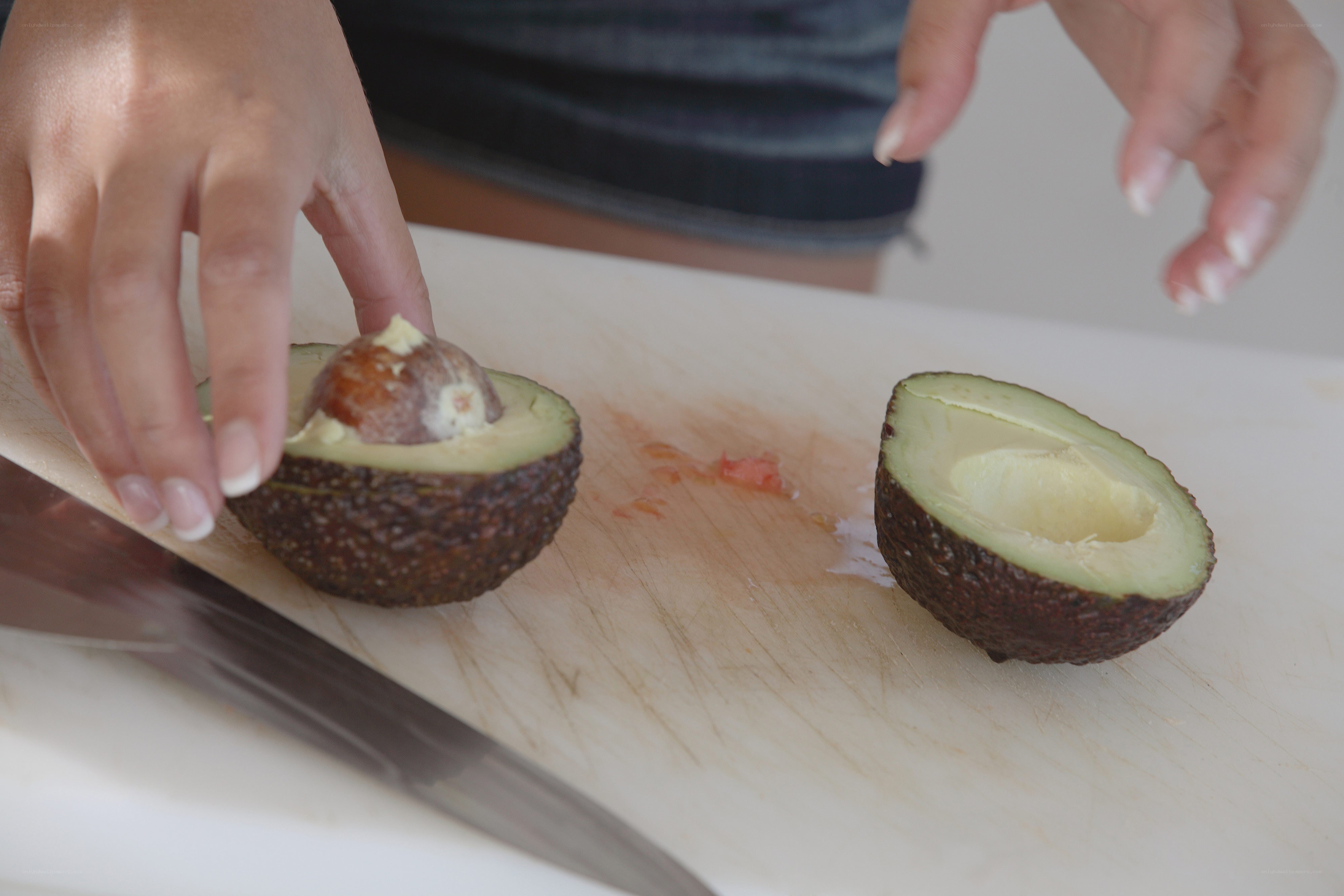 Avocado being prepared