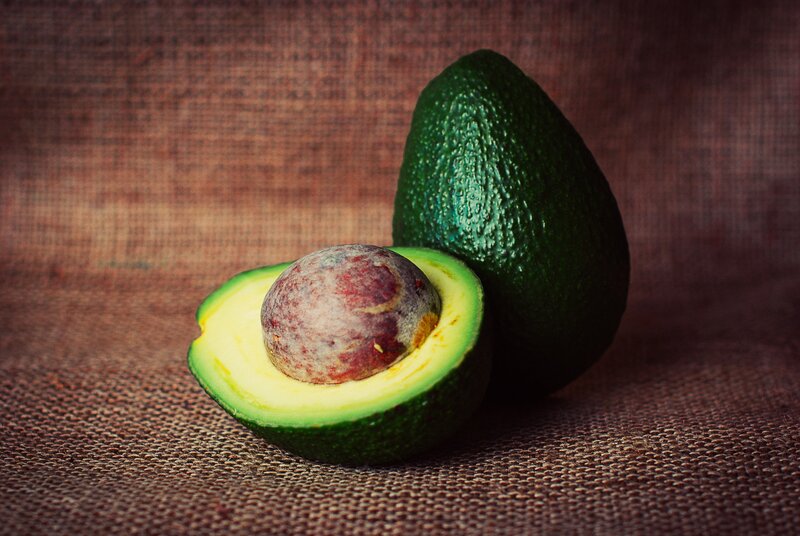 Avocado on burlap background