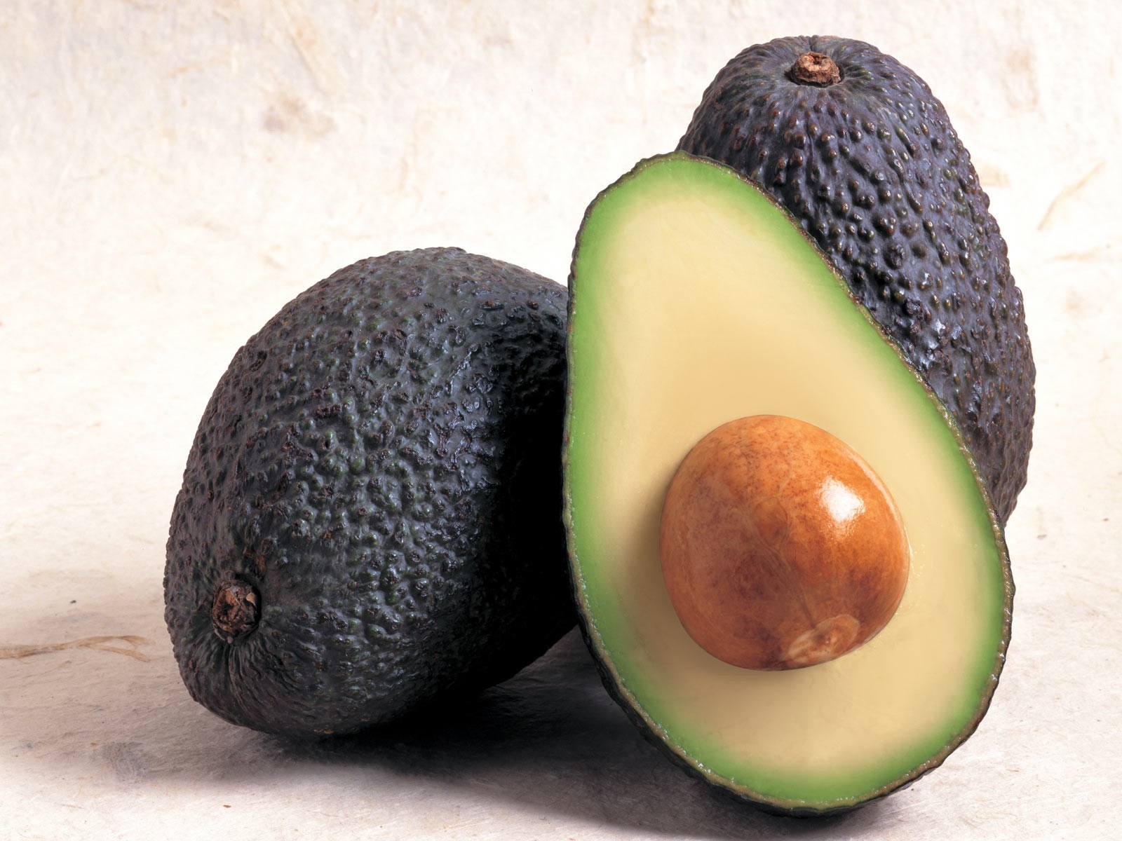 Avocados on a surface