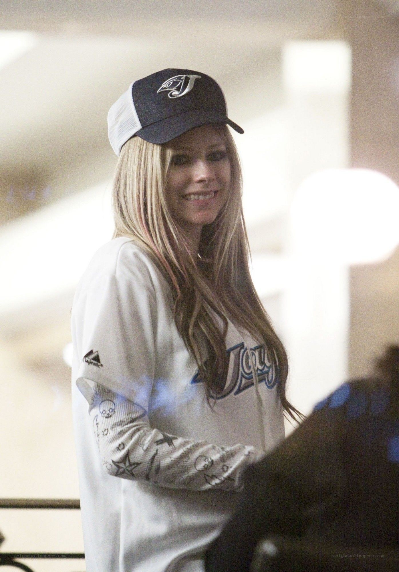 Avril Lavigne at a baseball game