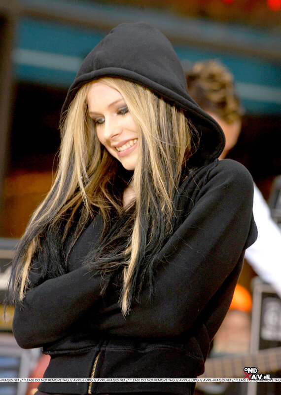 Avril Lavigne in a black hoodie