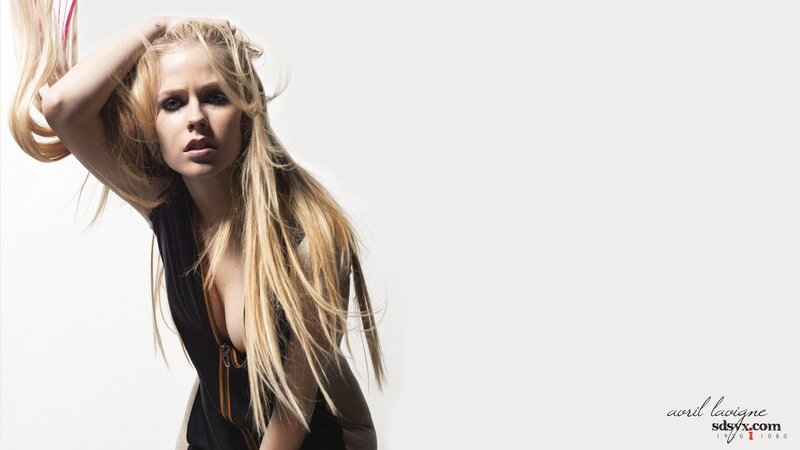 Avril Lavigne in a black top
