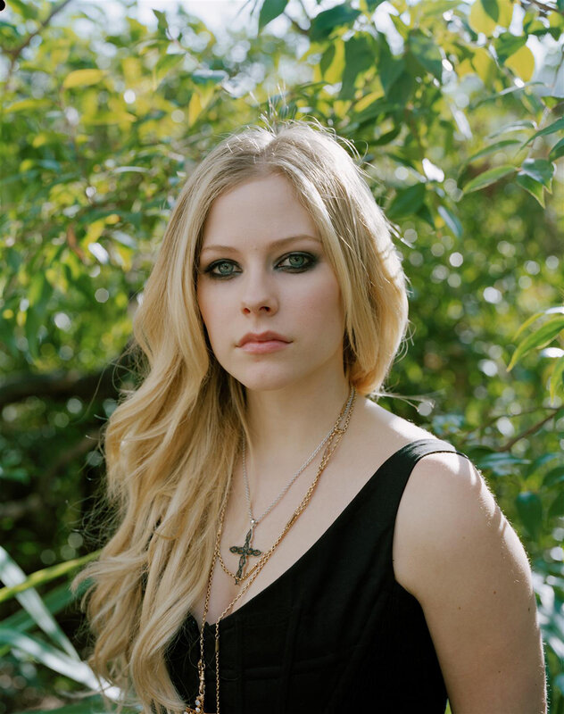 Avril Lavigne in a garden