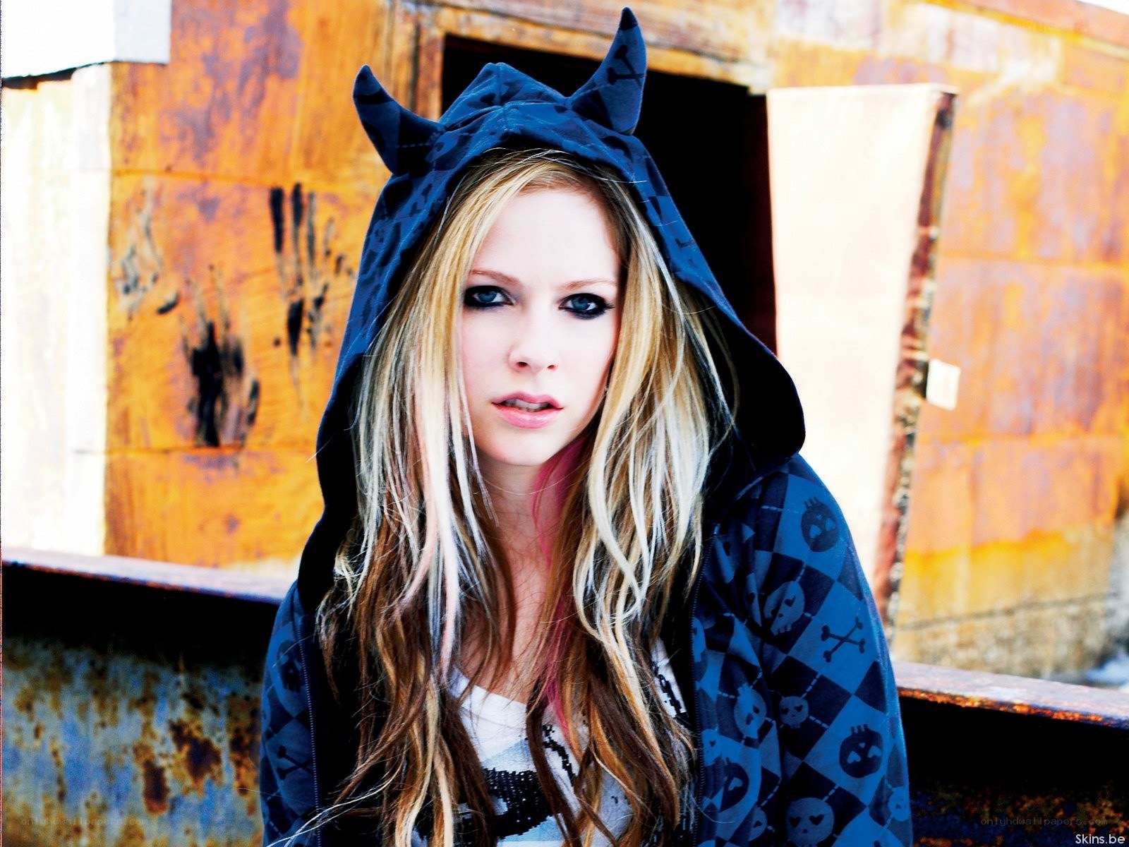 Avril Lavigne in a hooded jacket