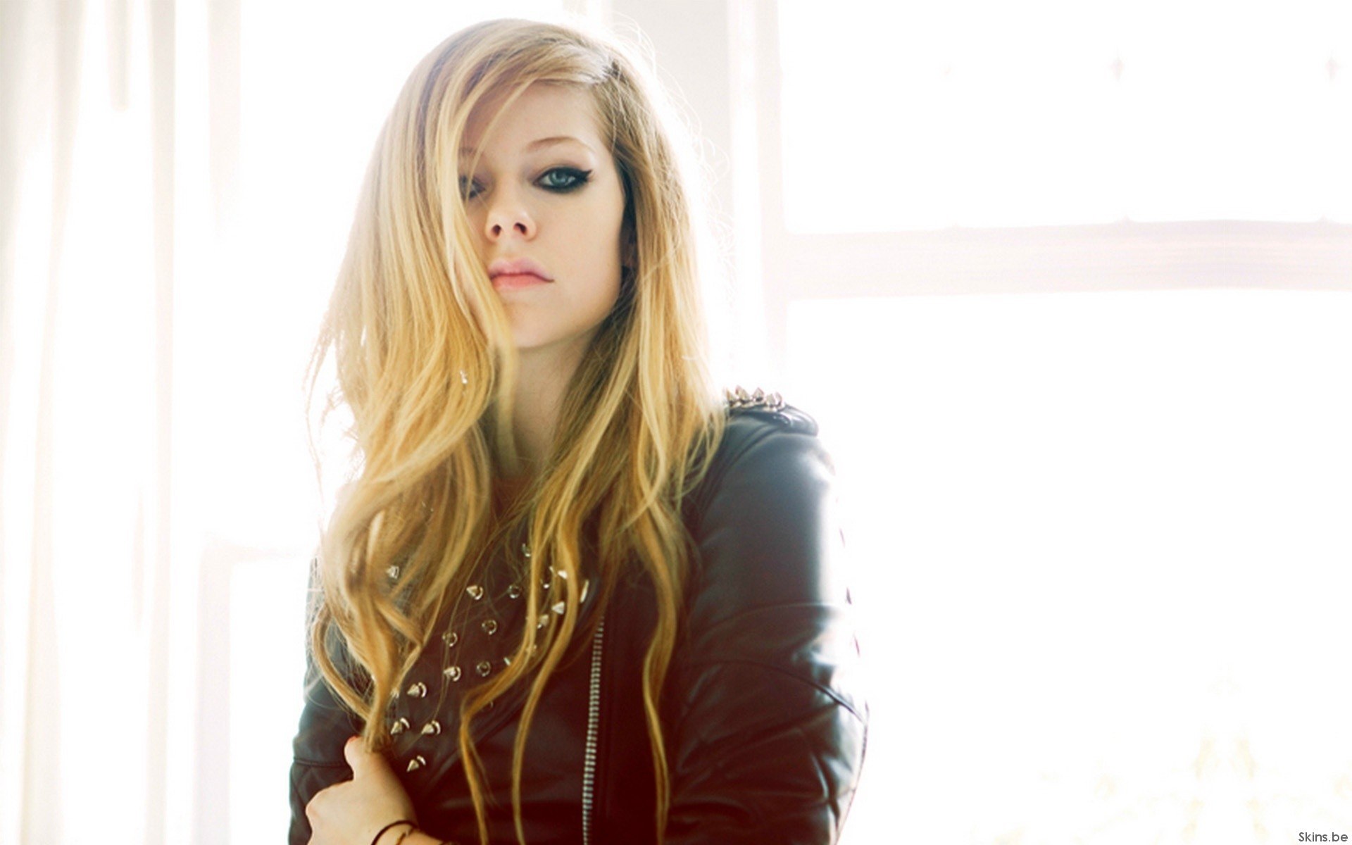 Avril Lavigne in a leather jacket