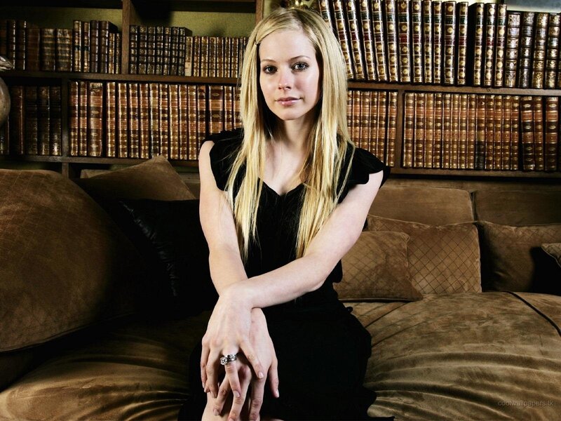 Avril Lavigne in a library