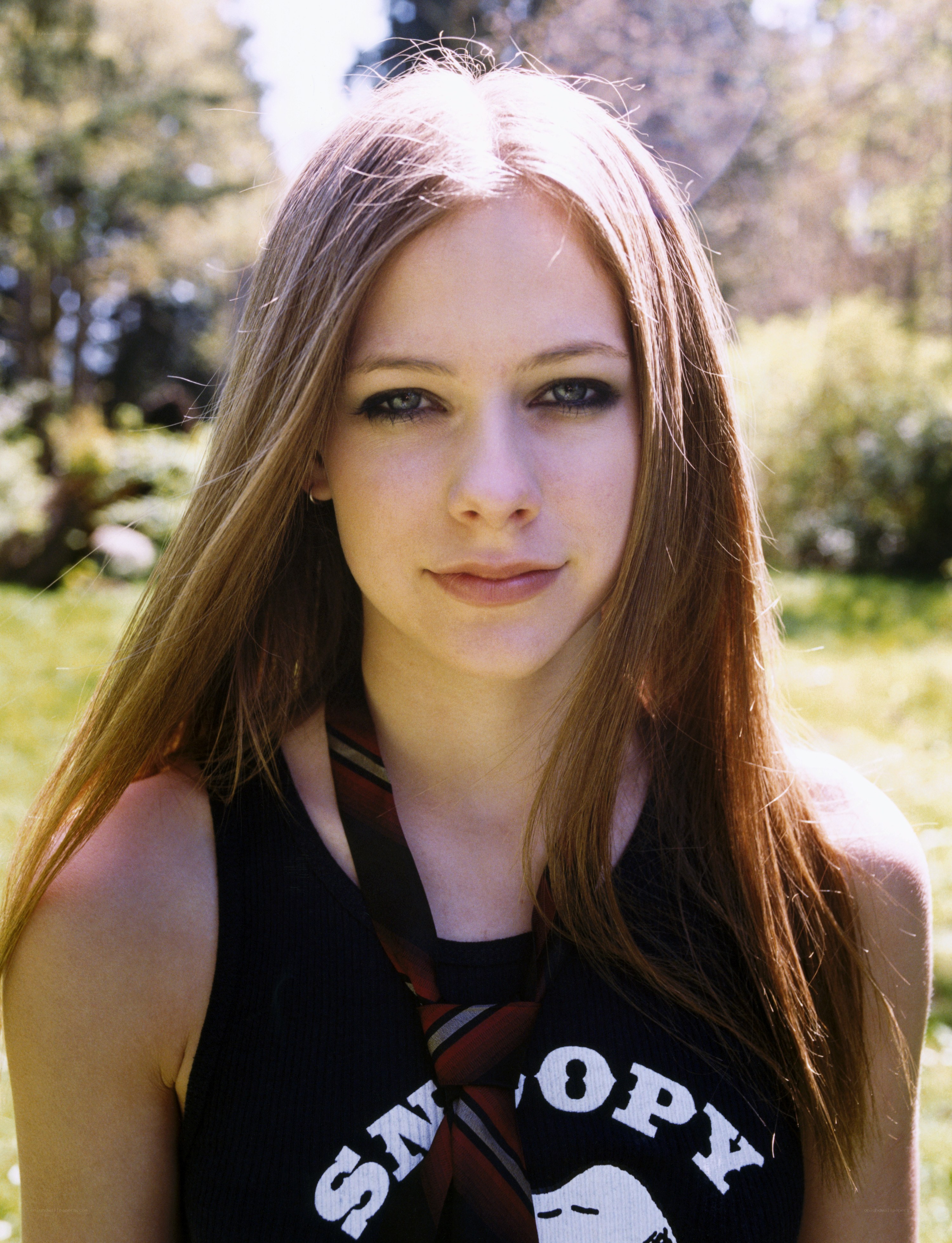 Avril Lavigne in a park