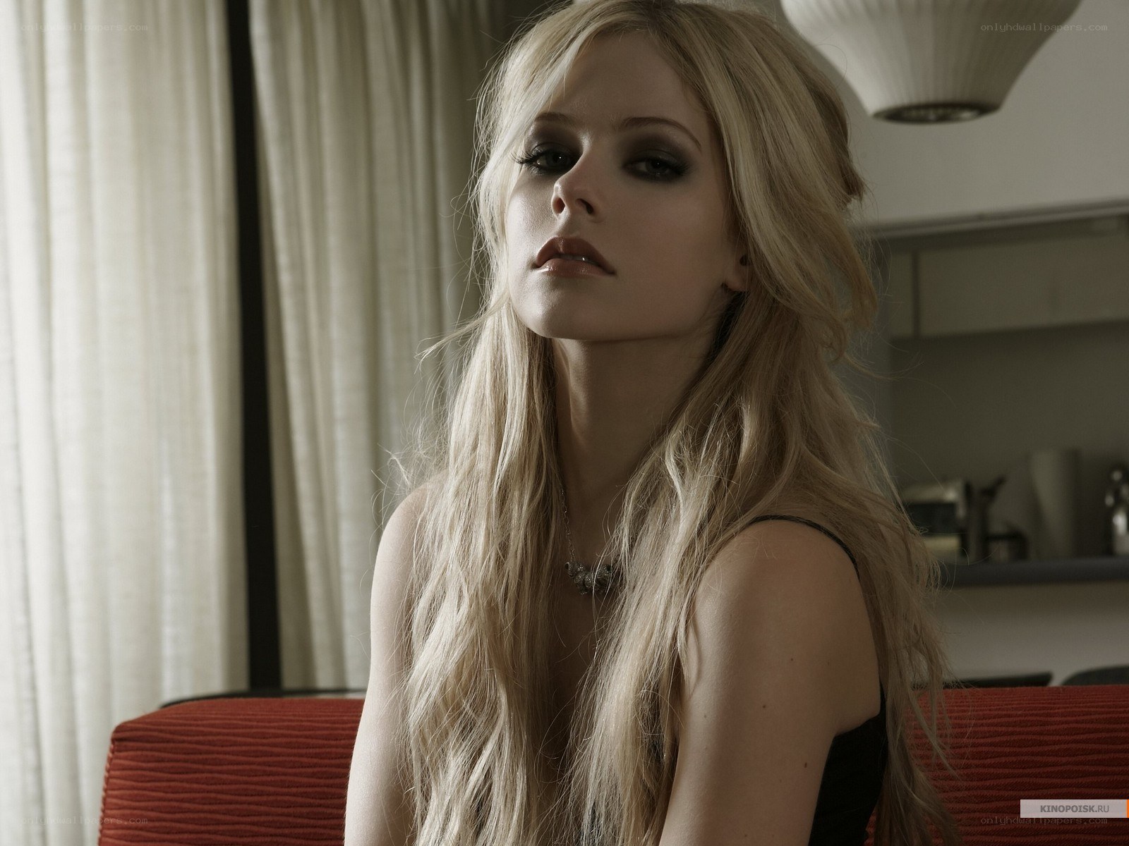 Avril Lavigne in a room