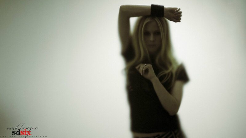 Avril Lavigne in a studio pose