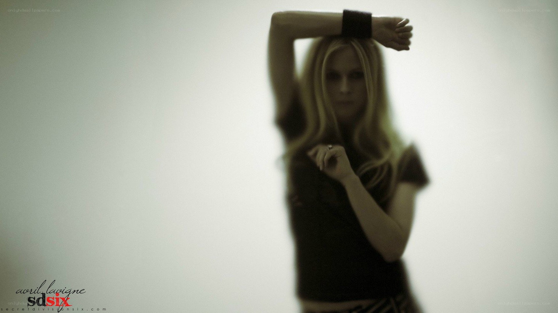 Avril Lavigne in a studio pose