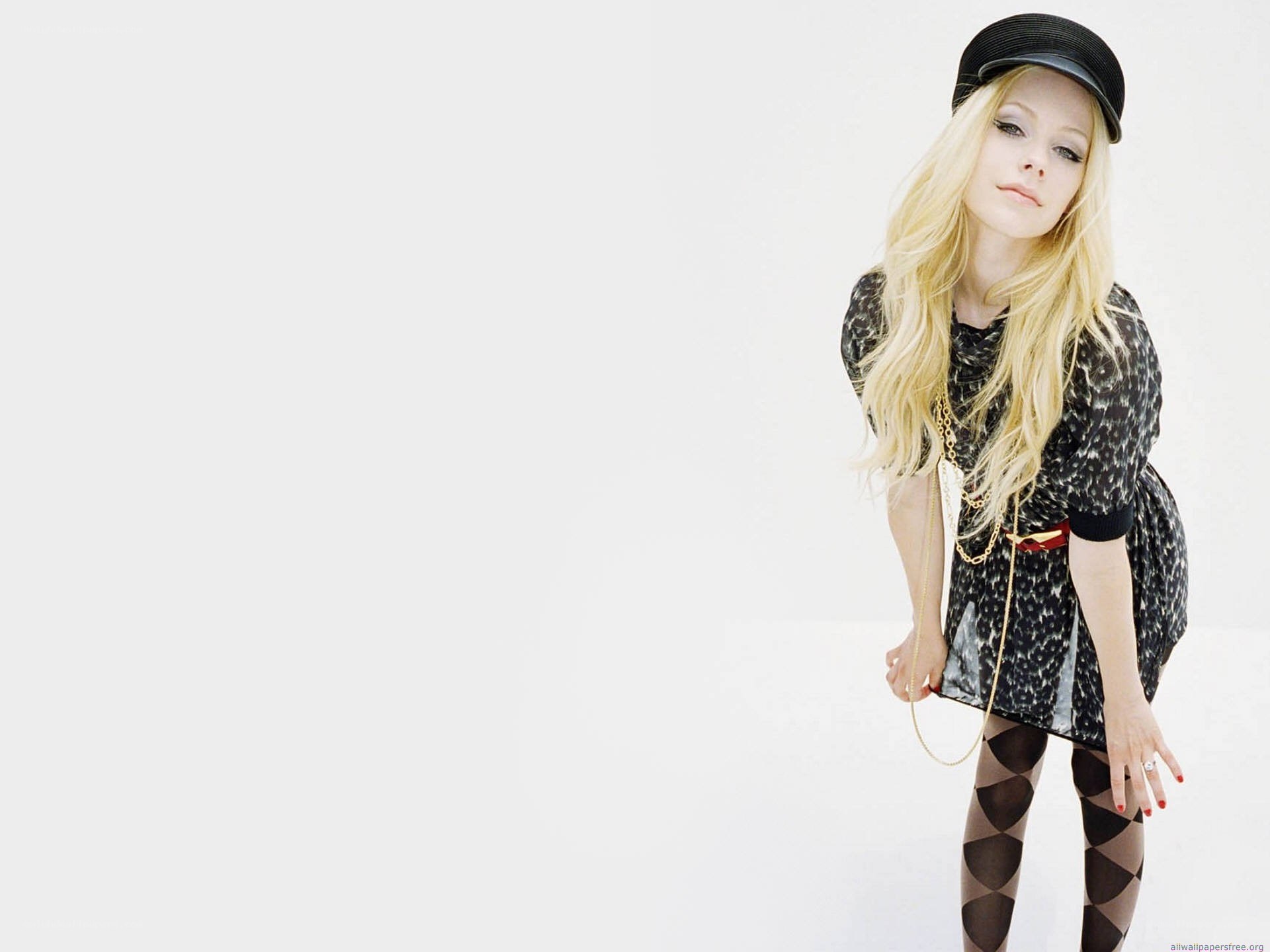 Avril Lavigne in a stylish pose