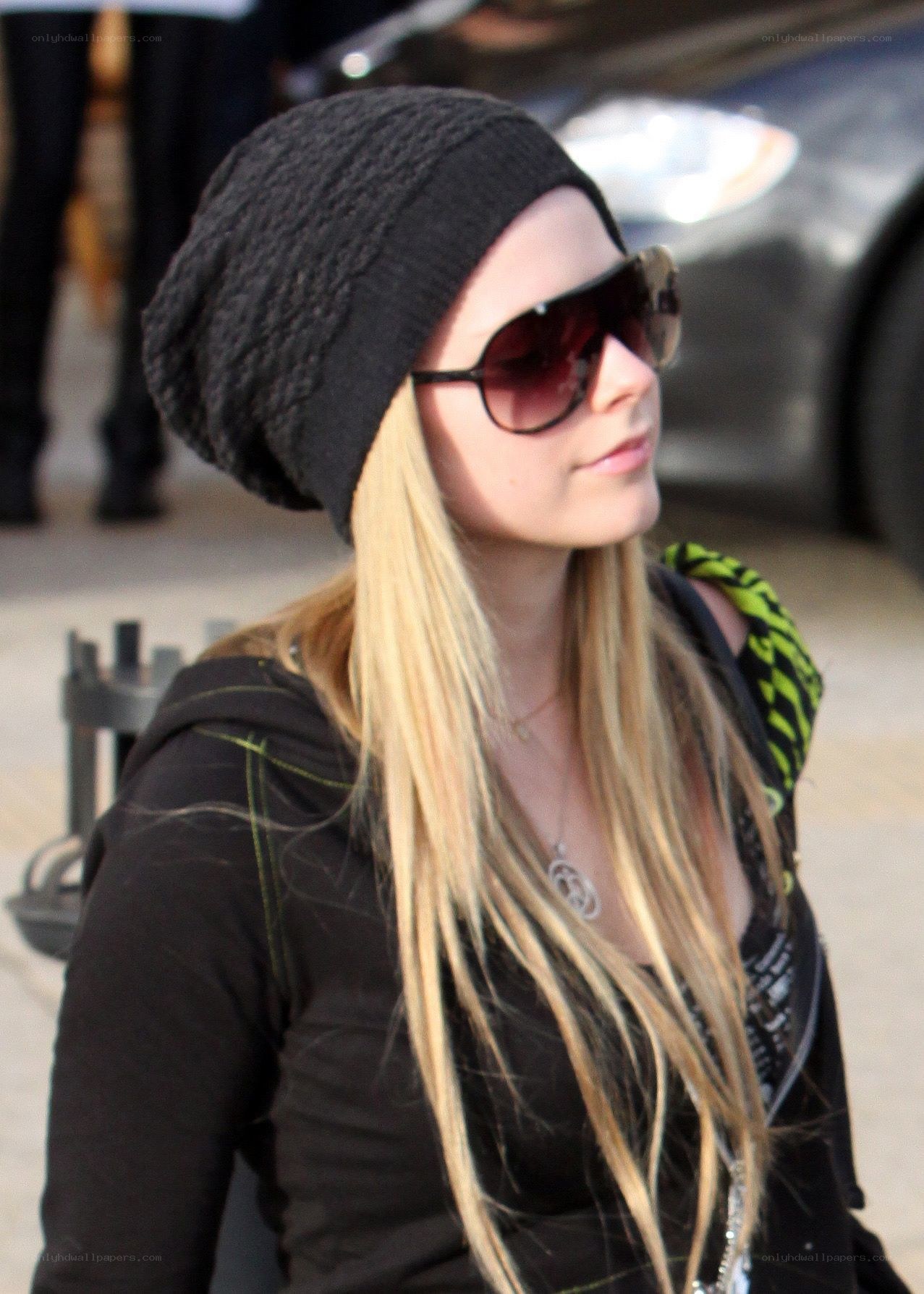 Avril Lavigne in black beanie