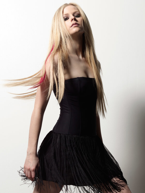 Avril Lavigne in black dress