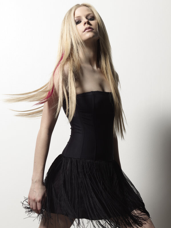Avril Lavigne in black dress