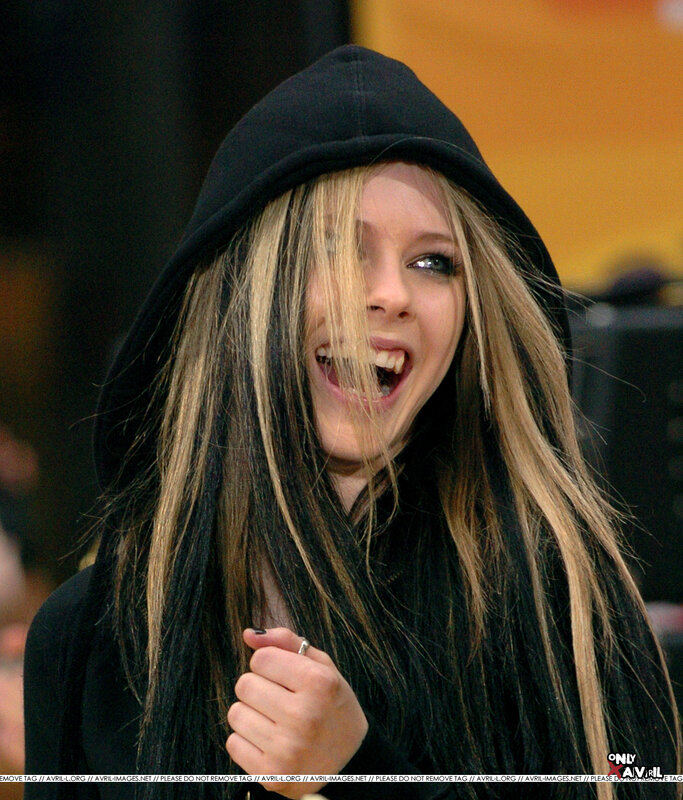 Avril Lavigne in black hoodie