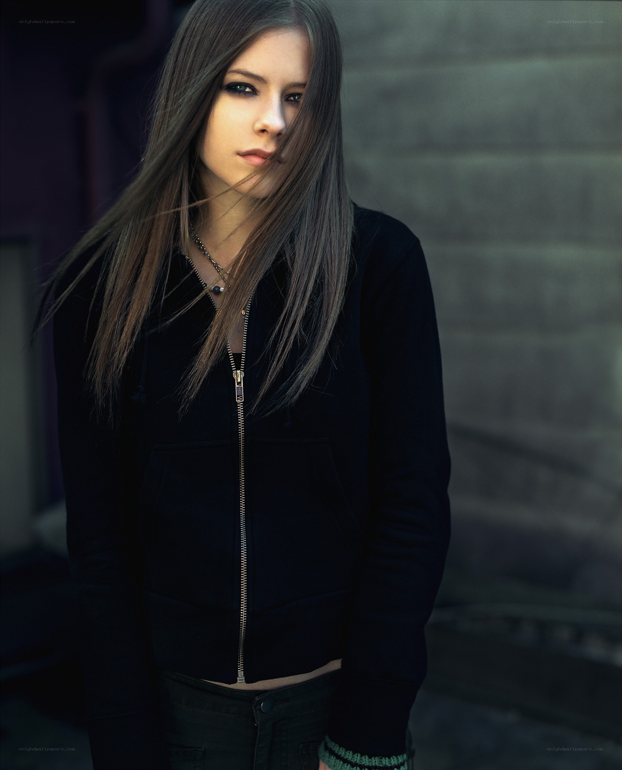 Avril Lavigne in black jacket