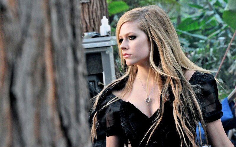Avril Lavigne in forest setting