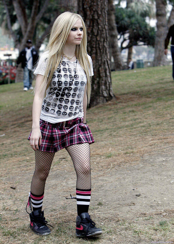 Avril Lavigne in plaid skirt
