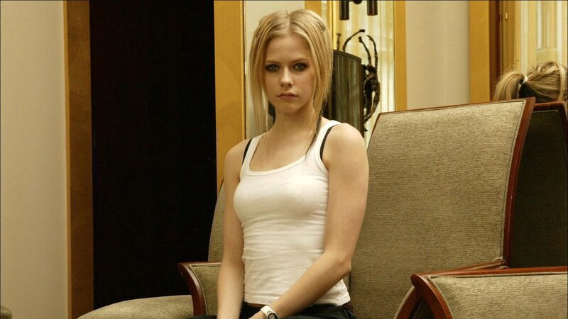 Avril Lavigne in white tank top