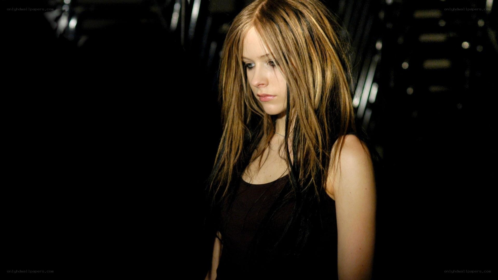 Avril Lavigne looking down
