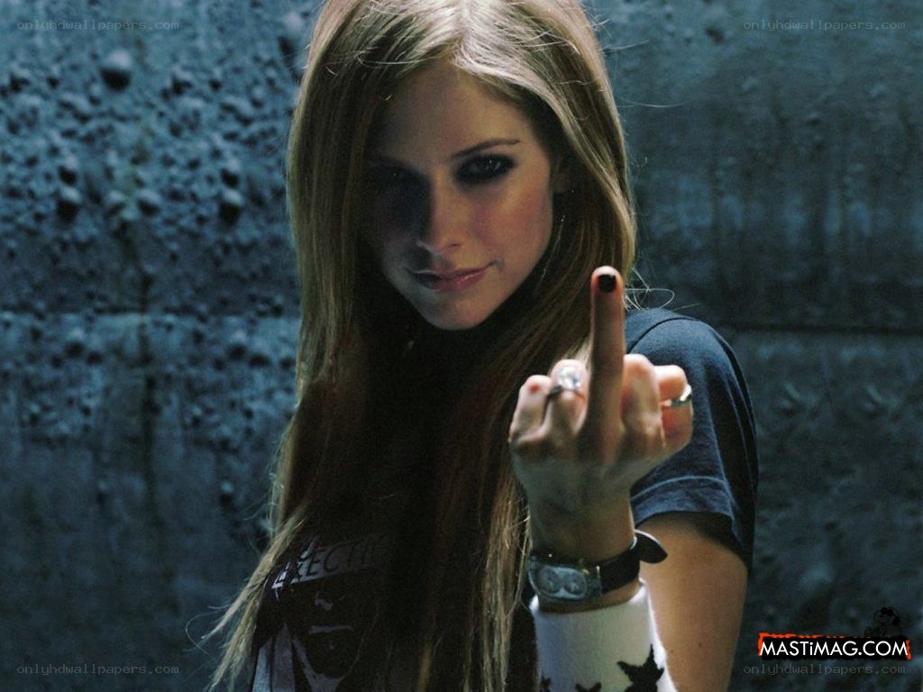 Avril Lavigne making a gesture