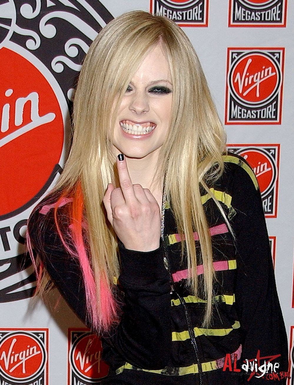 Avril Lavigne making a gesture