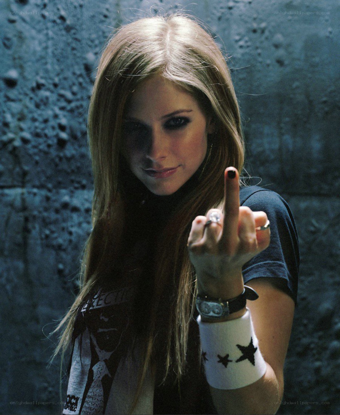 Avril Lavigne making a gesture