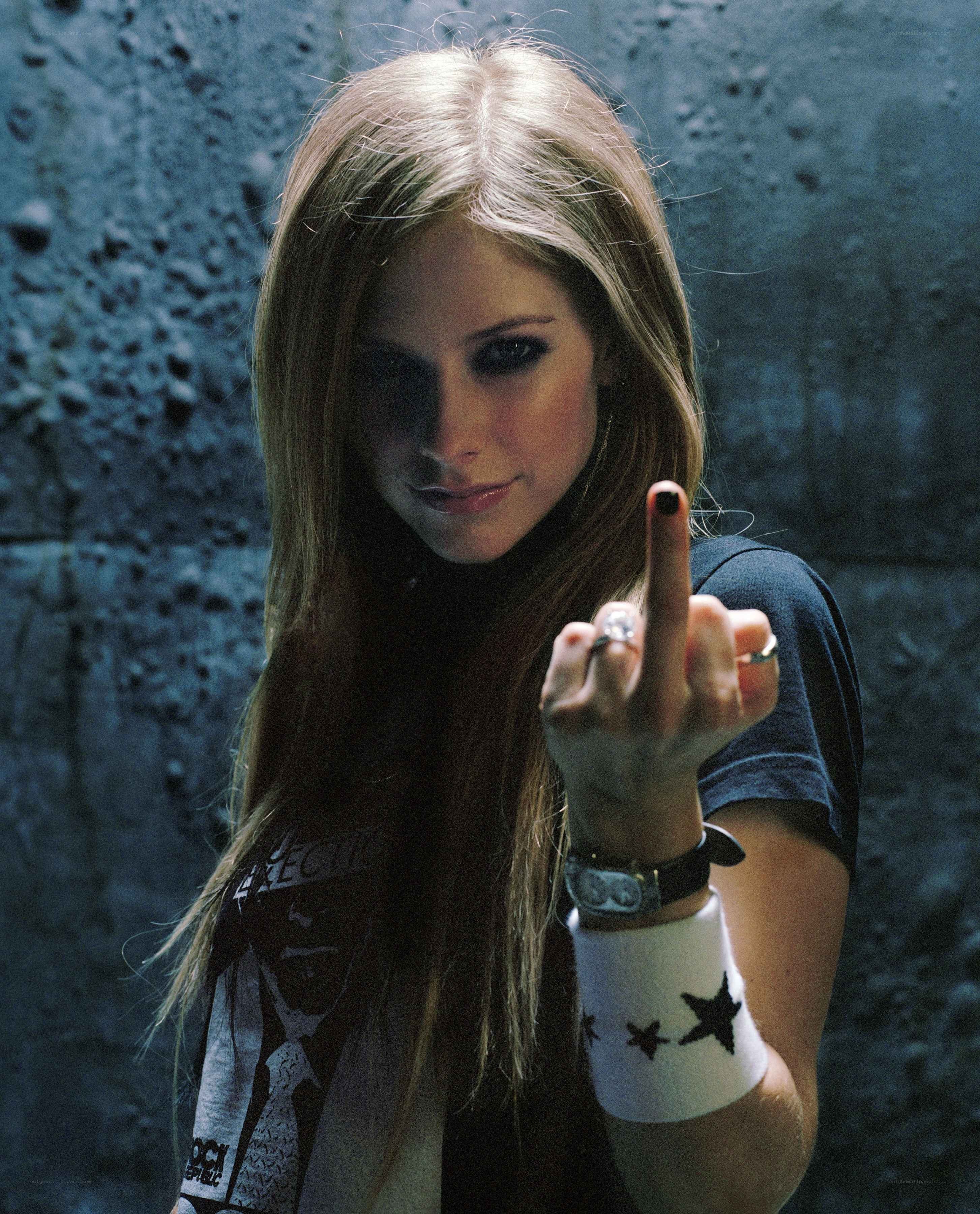 Avril Lavigne making a gesture
