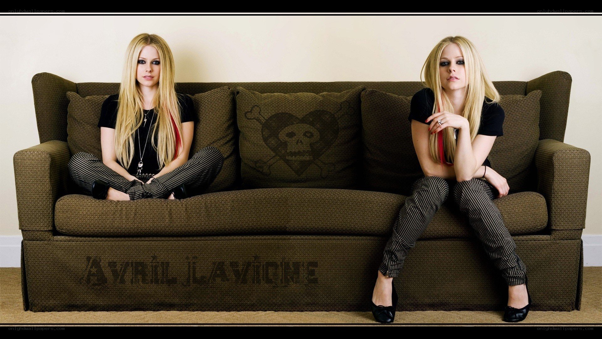 Avril Lavigne on a couch