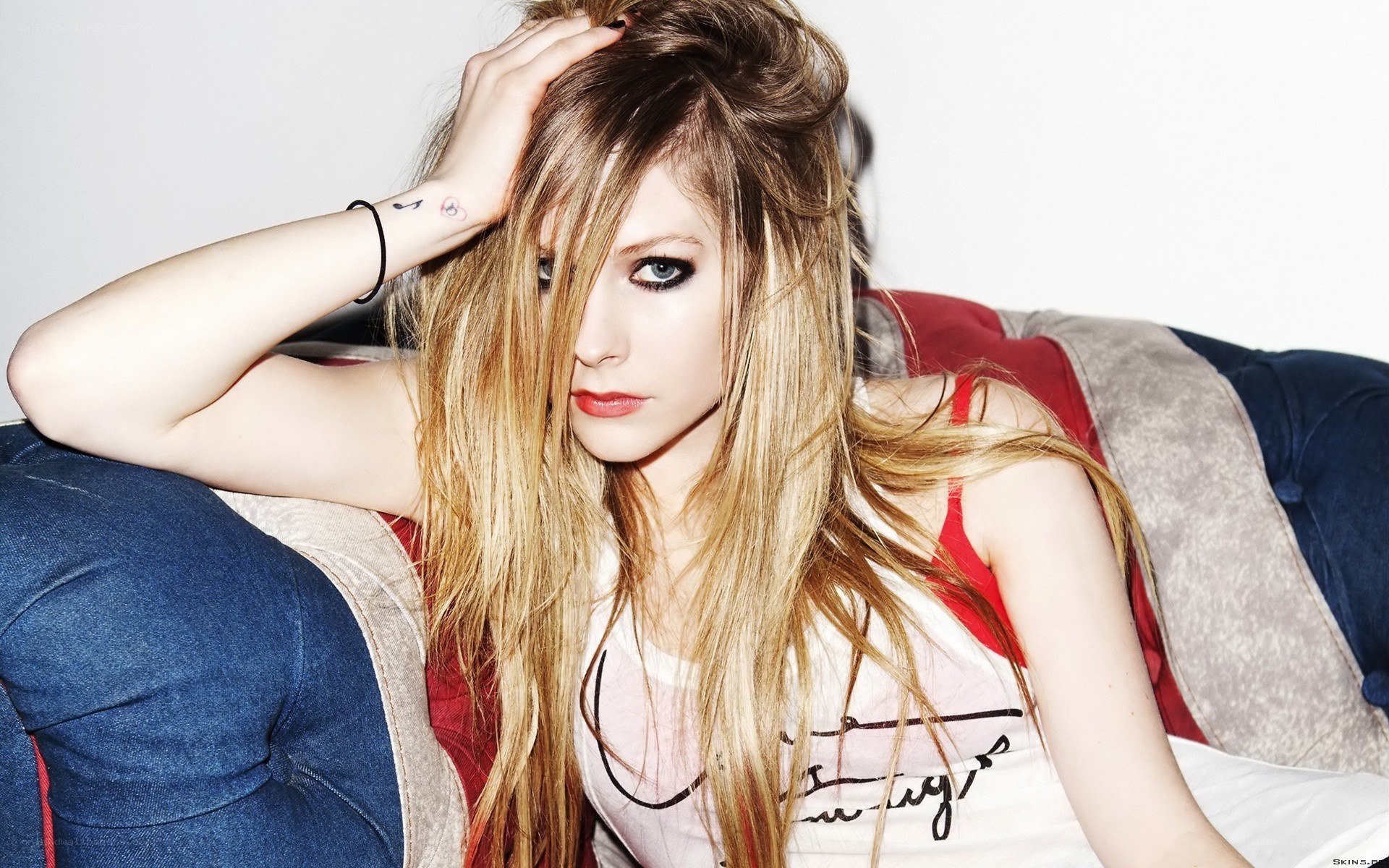 Avril Lavigne on a couch