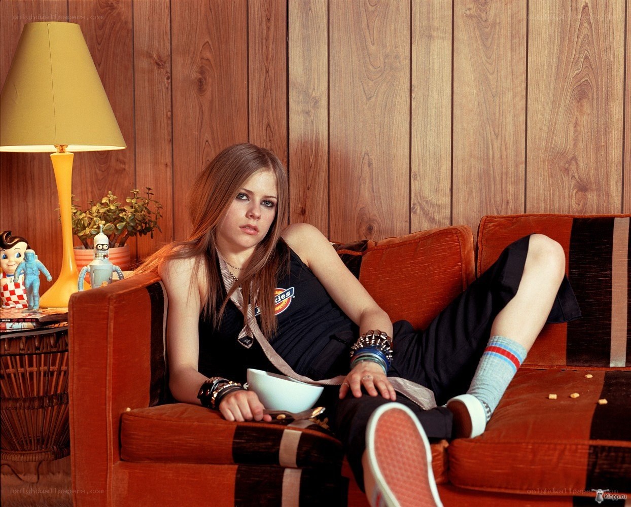 Avril Lavigne on a couch