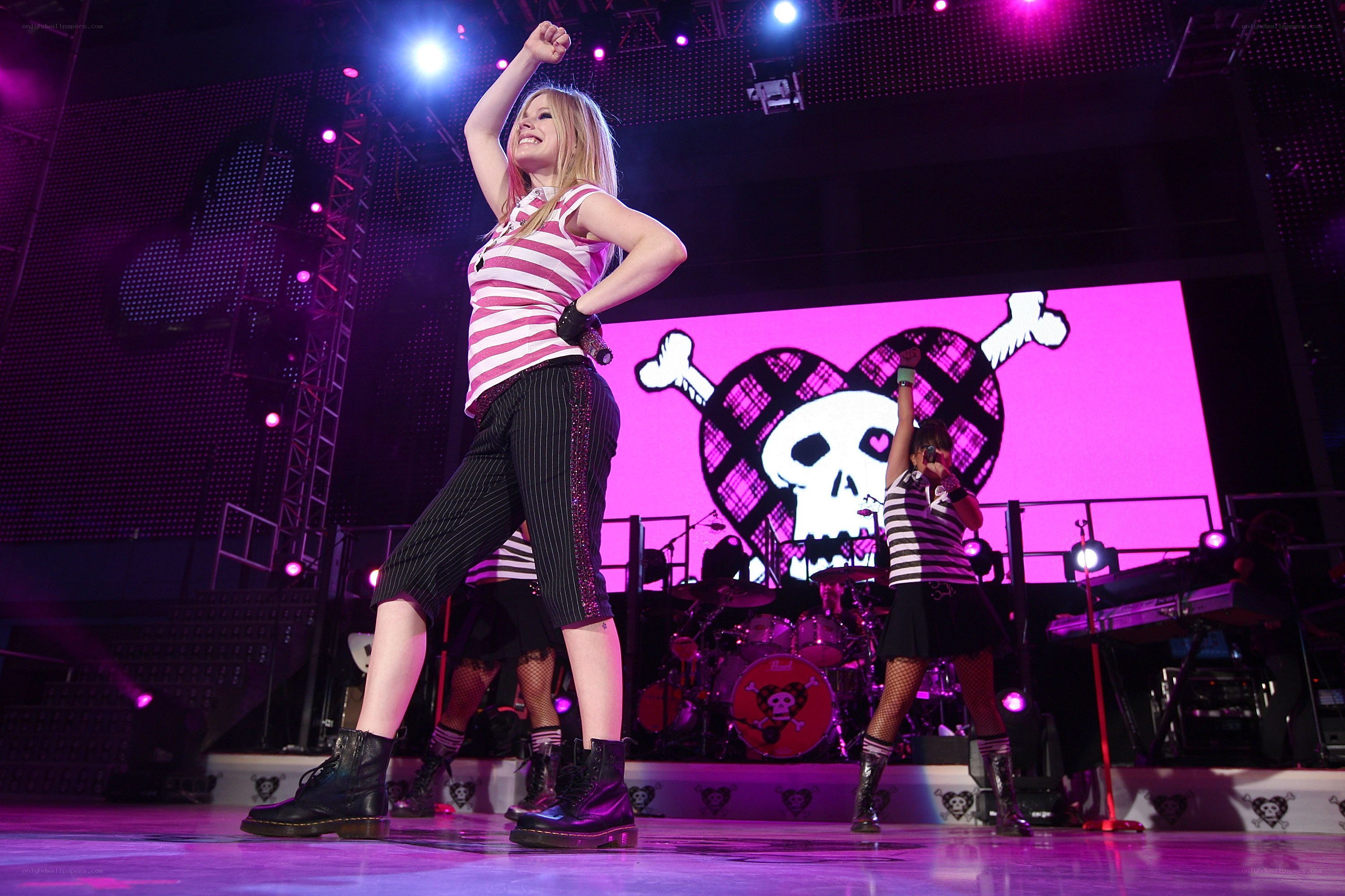 Avril Lavigne performing on stage