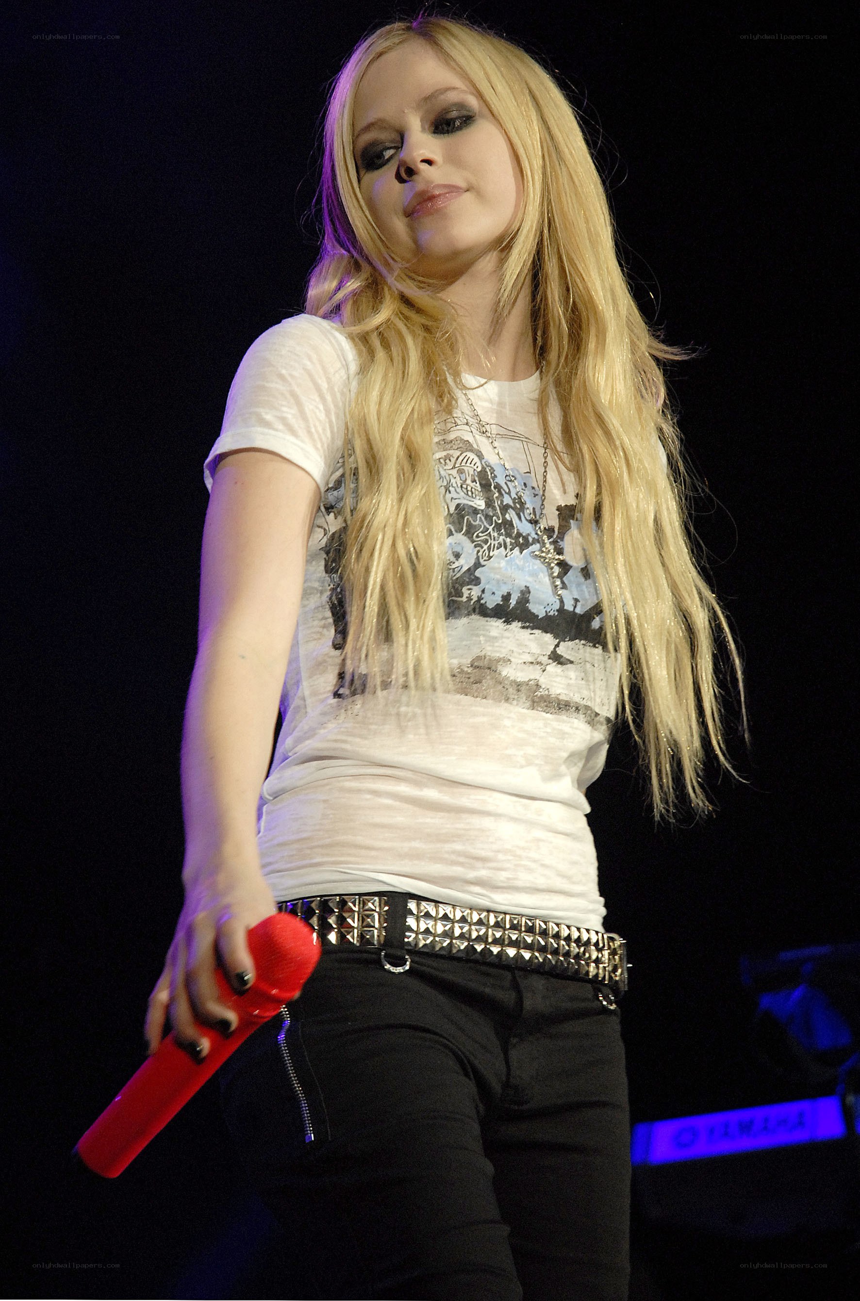 Avril Lavigne performing on stage