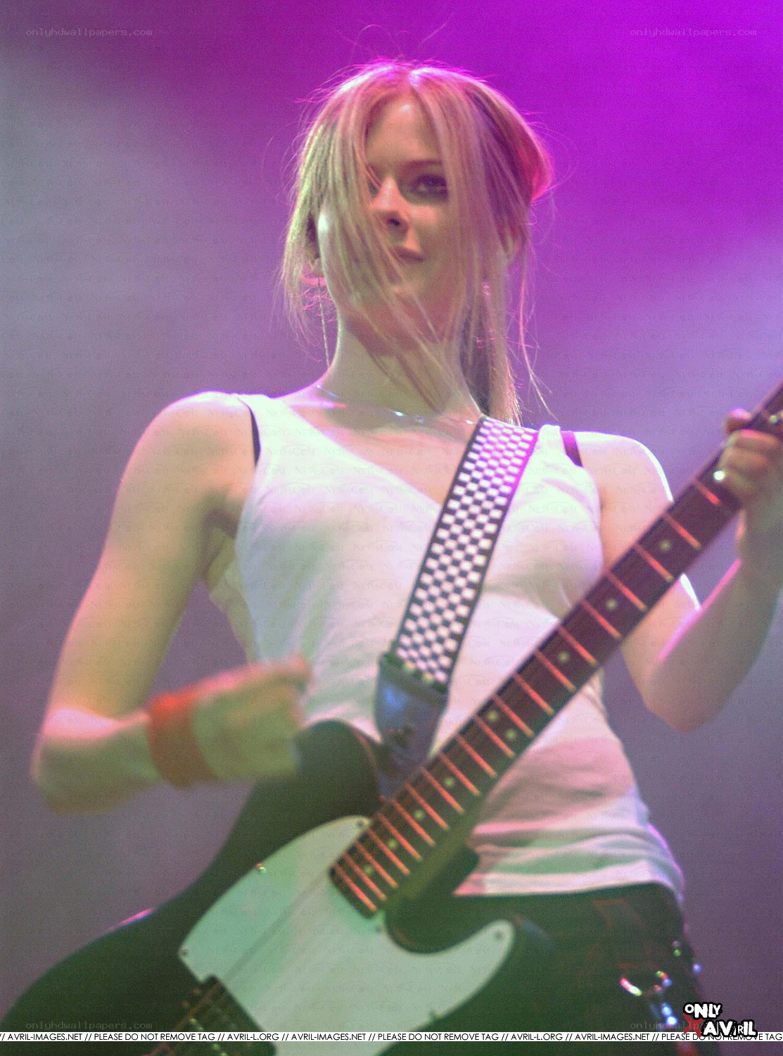 Avril Lavigne playing guitar