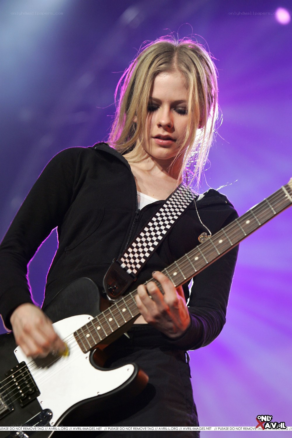 Avril Lavigne playing guitar