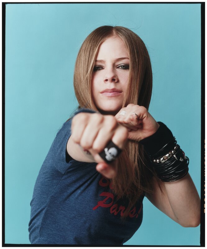 Avril Lavigne pointing at camera