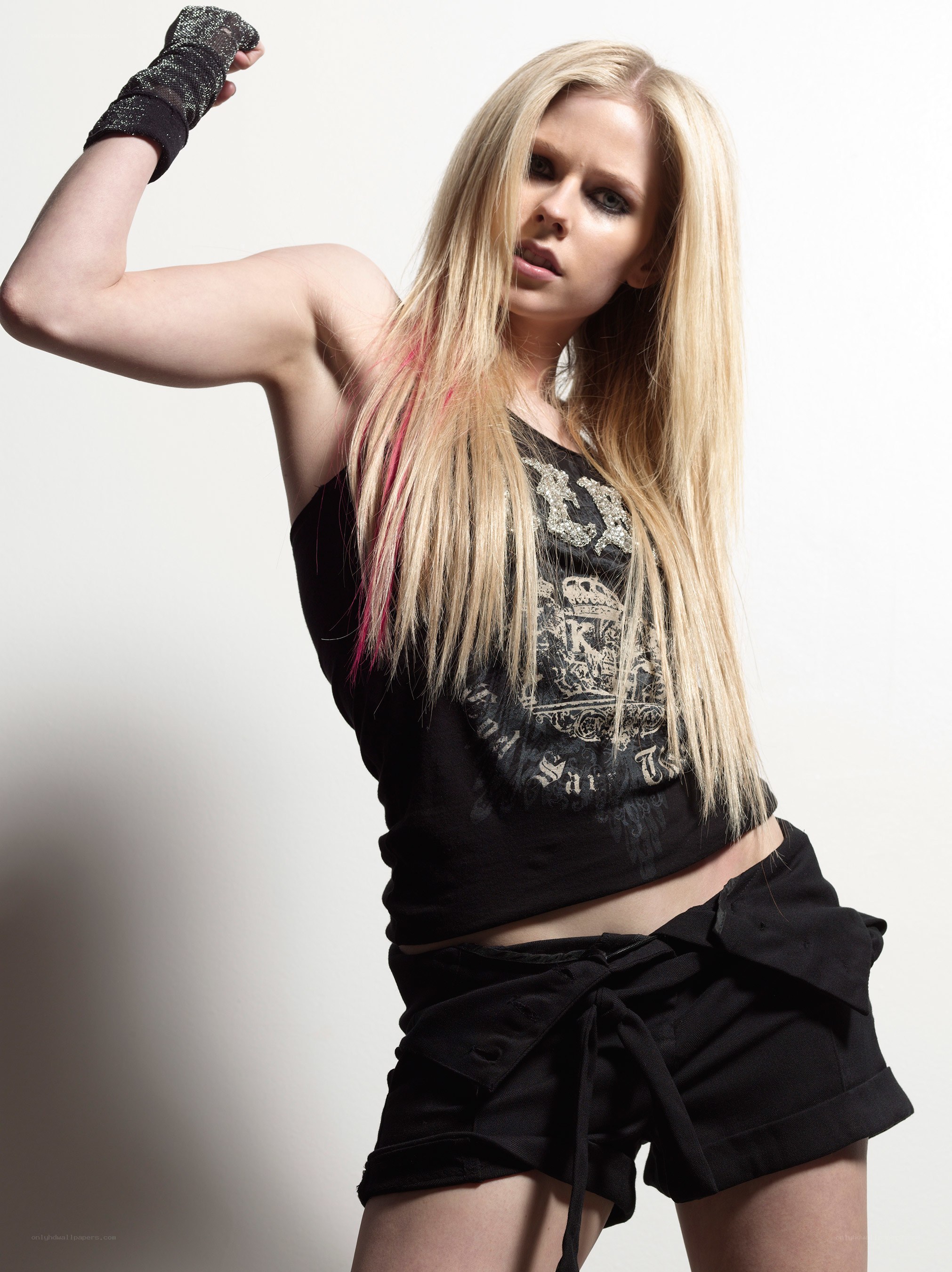 Avril Lavigne posing confidently