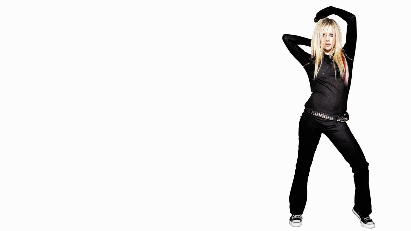 Avril Lavigne posing in black