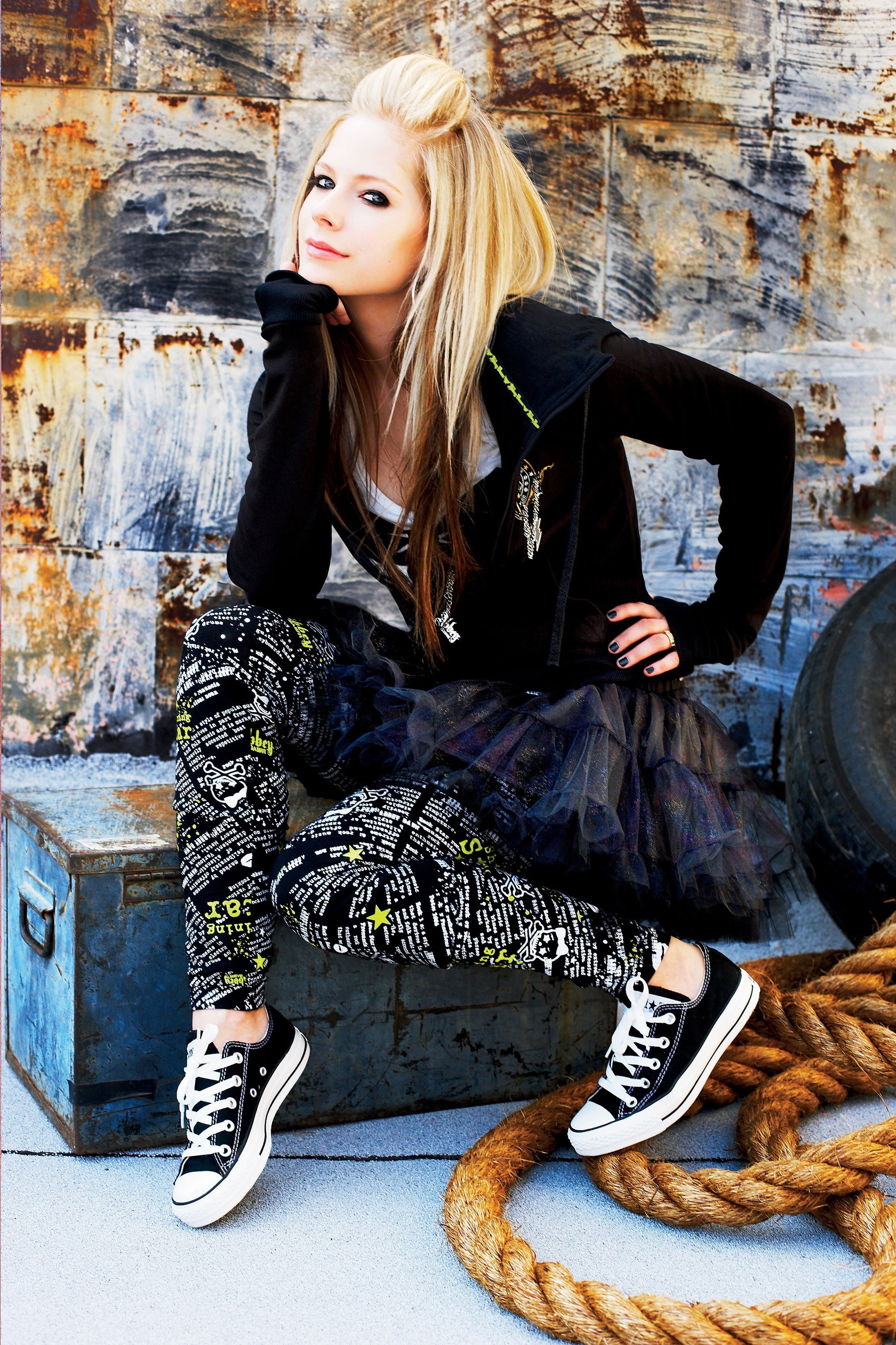 Avril Lavigne posing in urban setting