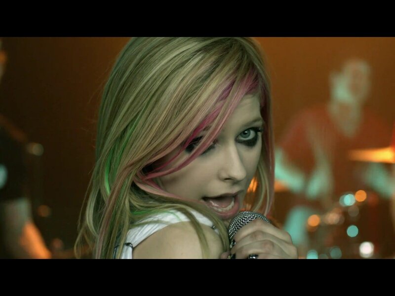 Avril Lavigne singing on stage