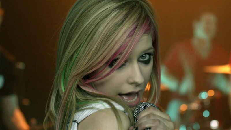 Avril Lavigne singing on stage
