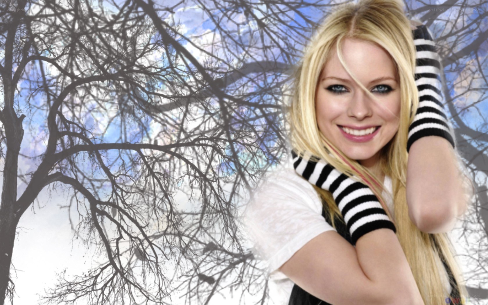 Avril Lavigne smiling outdoors