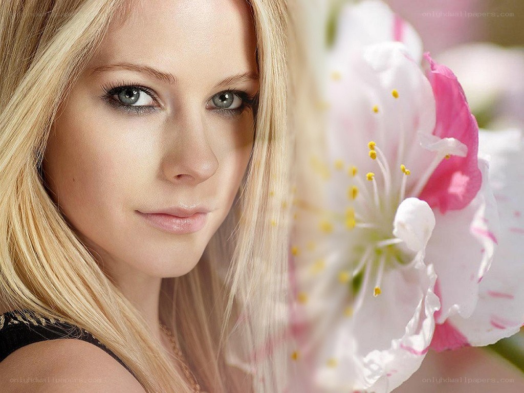 Avril Lavigne with a flower