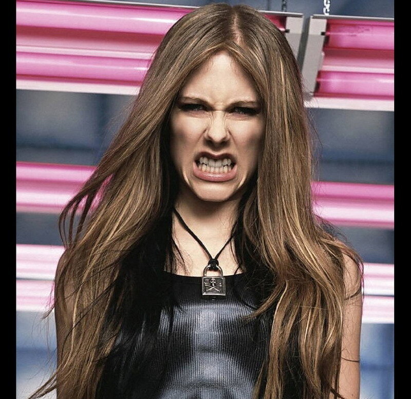 Avril Lavigne with angry expression