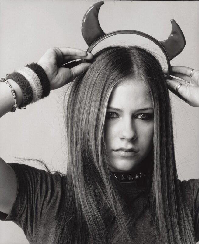 Avril Lavigne with devil horns