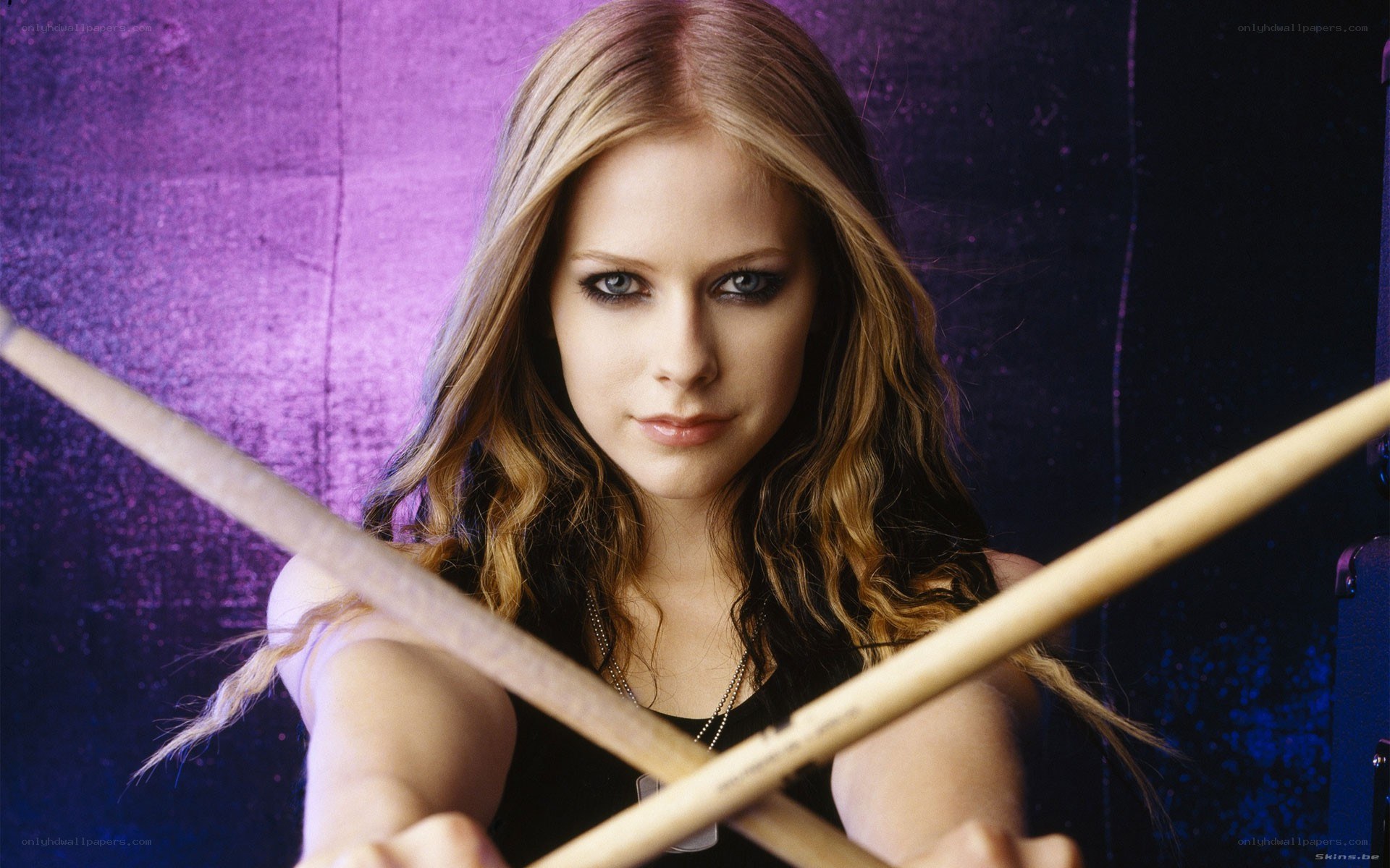Avril Lavigne with drumsticks