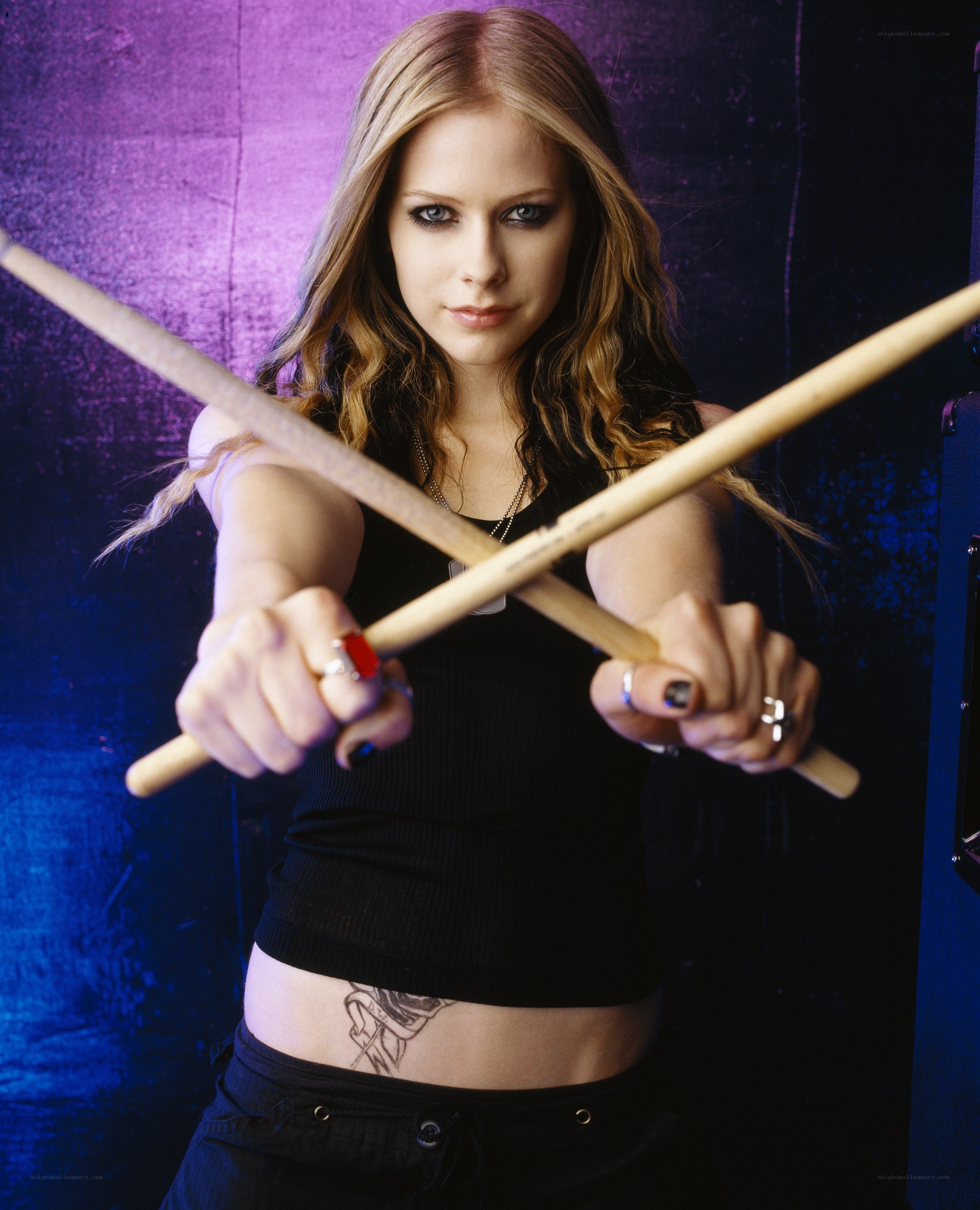 Avril Lavigne with drumsticks