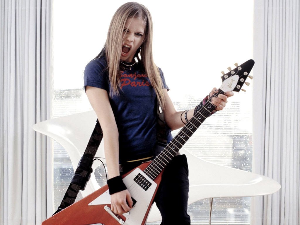 Avril Lavigne with electric guitar