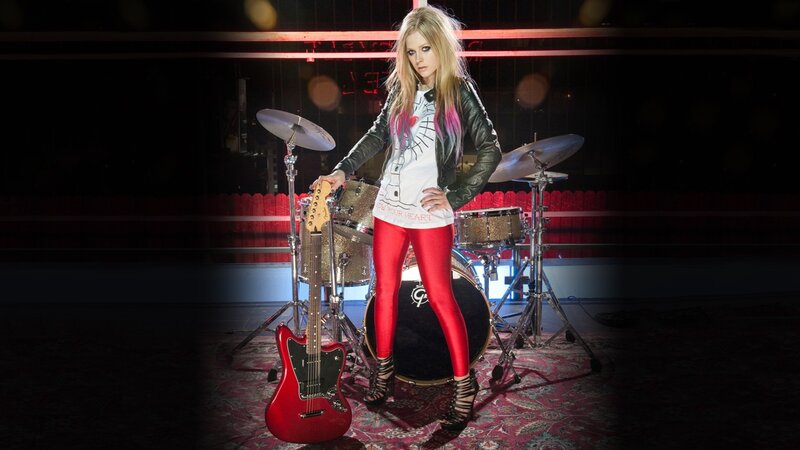 Avril Lavigne with guitar and drums