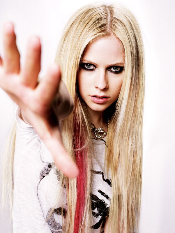 Avril Lavigne with hand forward